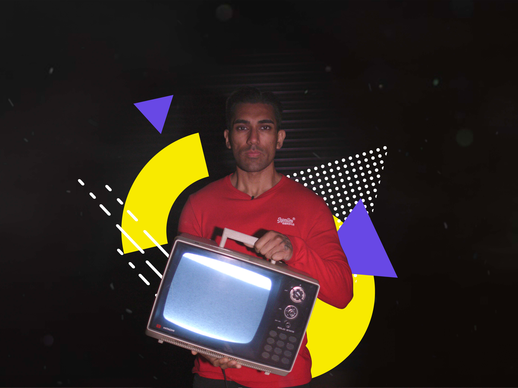 shot of co-founder Joey Xoto holding TV in the dark as part of Viddyoze personal brand story video.